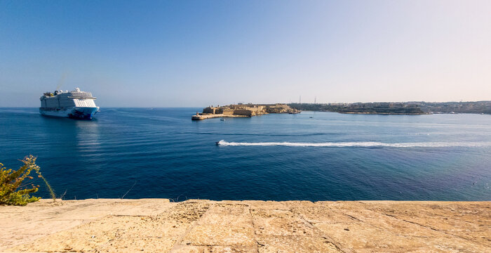 Cruise ship entering Valletta Harbor on the island of Malta rounding Fort Ricasoli