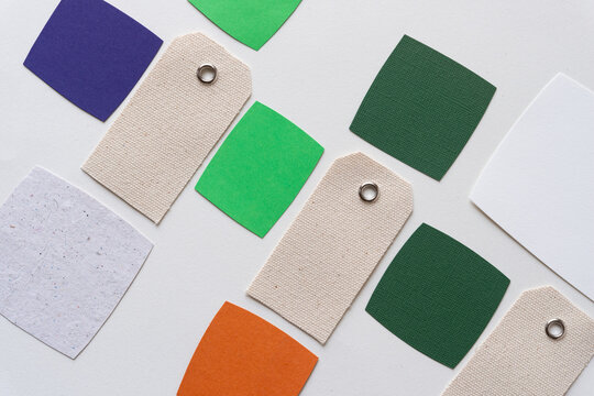 canvas tags and paper squares on blank paper