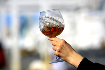 a glass of port wine in hand, portugal drink alcohol