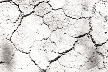 Texture soil dry crack background pattern of drought lack of water of nature white black old broken.