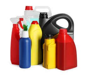 Many bottles and canisters with liquids on white background