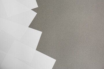 Blank white paper sheets on grey background, flat lay. Space for text