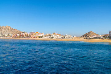 Fototapeta premium View from the Pacific Ocean near Land's End of the luxury resorts and hotels along Wejulia Beach at Cabo San Lucas, Mexico, along the Mexican Riviera.
