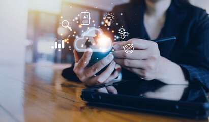 man use Laptop with cloud computing diagram show on hand. Cloud technology. Data storage. Networking and internet service concept.