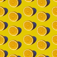 Seamless pattern with lemons on a yellow background. For printing on paper, corton, textiles, covers.