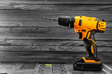 Cordless drill also work as a screwdriver. Copyspace