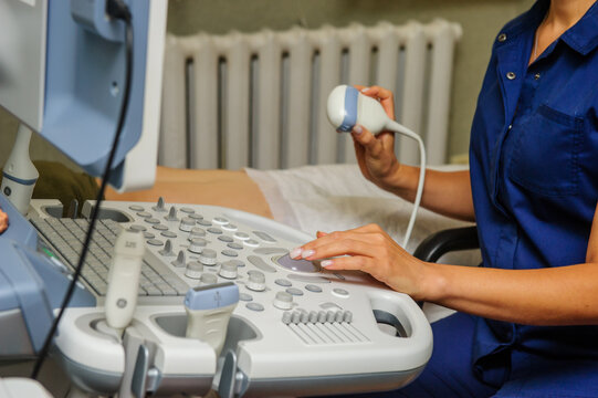 VINNITVINNITSA,UKRAINE .OCTOBER 25 of 2022:Medical specialists near ultrasound machine in the hospital ward
