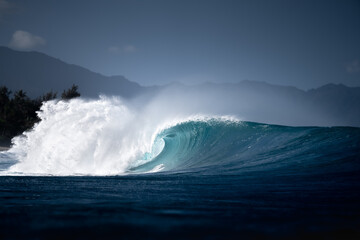 Beautiful deep blue tube ocean wave barrel 