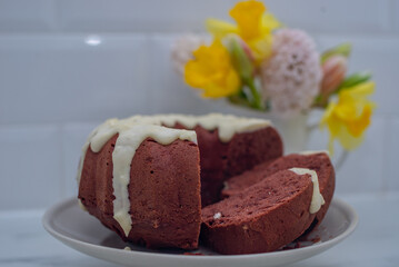 Freshly baked red velvet bundt cake on a table