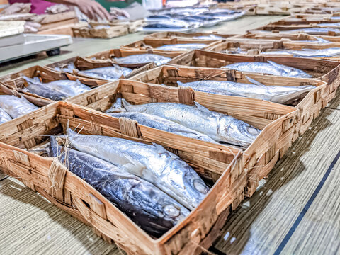 DEPOK, WEST JAVA - INDONESIA, January 29, 2023. Selective focus. Morning shopping activities in traditional market located in Pasar Jaya Depok, West Java. It provides shoppers with vegetables, fishes,
