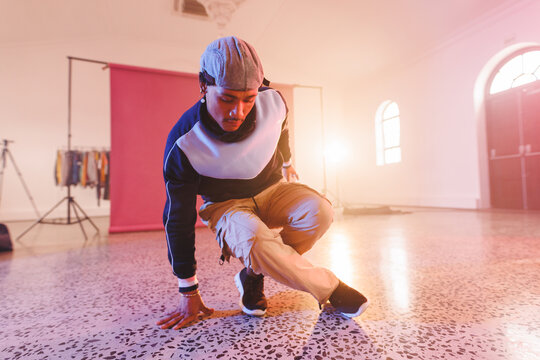 Image of biracial male hip hop dancer in studio