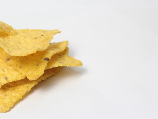 close up tortilla chips isolated on white background, side view