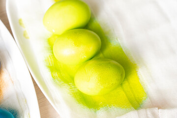 Painted eggs on the table after painting, a symbol of Easter, eggs 