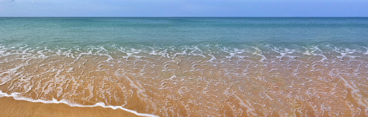 Beautiful natural background with sea view. Perfect seascape. Wide panorama. Idea for horizontal banner. Tropical paradise. Expanse of ocean. Sand beach, waterfront. Transparent water. Empty backdrop.