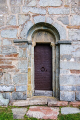 Old beautiful door to a medieval church