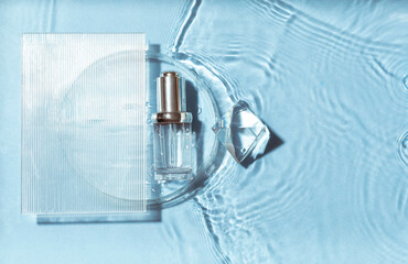 Obraz na płótnie Canvas Cosmetic spa medical skincare, glass serum bottle in petri dish with collagen on blue water background with waves.