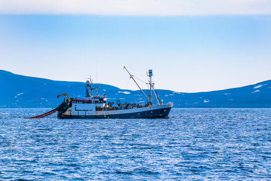 Fishing boat trawling for shrimp at Svalbard