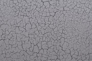 Abstract background black or gray background cracking.