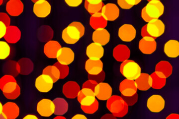 Colorful bokeh. The creative image of the bright lights. Blurred background.