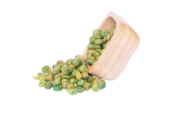 Green peas coated by salt overflowing from a wooden cup. A snack crispy baked. Suitable for...