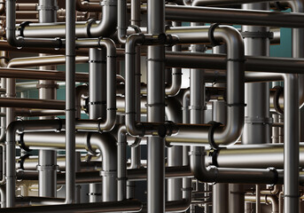 Industrial background. Gray pipes. Tangled industrial pipeline. Background for petrochemical industry. Steel backdrop. Industrial texture pattern. Pipes production equipment are intertwined. 3d image
