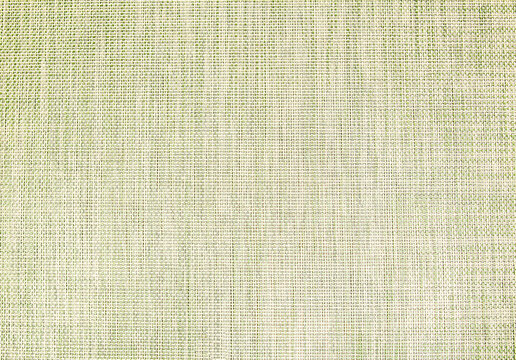 Abstract background of a gray-green fabric of a large weave close-up