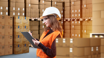 Delivery Warehouse Supervisor. Woman among pallets with boxes. Postal parcels around warehouse worker. Supervisor girl uses clipboard. Supervisor woman conducting audit in parcel warehouse