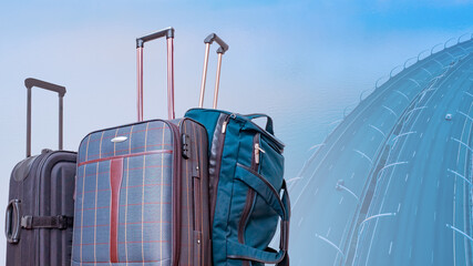 Travel bags. Bags for carrying personal belongings. Road bridge from birds eye view. Car travel bags with glass handle. Concept of long trip by car. Suitcases filled with things for business trip