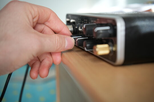 Person setting music audio interface 