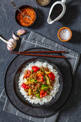 crispy ground beef with stir-fried veggies in bowl