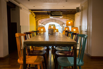 Elegant restaurant table with cutlery, crockery and glasses.