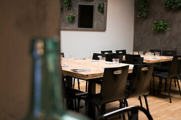 Elegant restaurant table with cutlery, crockery and glasses.