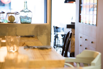 Elegant restaurant table with cutlery, crockery and glasses.