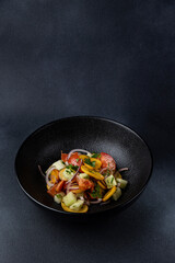 a delicious salad on a plate prepared in a restaurant.
