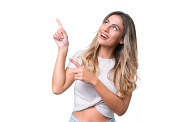 Young Uruguayan woman over isolated background pointing with the index finger a great idea