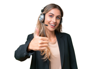 Telemarketer pretty Uruguayan woman working with a headset over isolated background with thumbs up because something good has happened