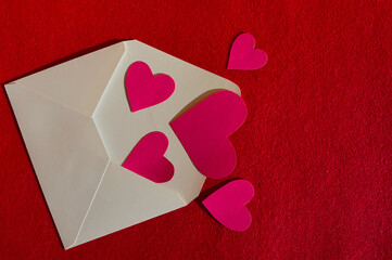 Valentine's day. holiday of lovers, love. a valentine in the shape of a heart. viva magenta. background for the design.