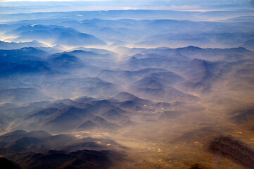 Fototapeta na wymiar foggy mountains at sunrise. Mountain silhouettes, mountain ranges. Rize, Turkey