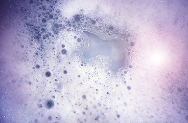 foam blue texture soap bubbles on the water abstract background