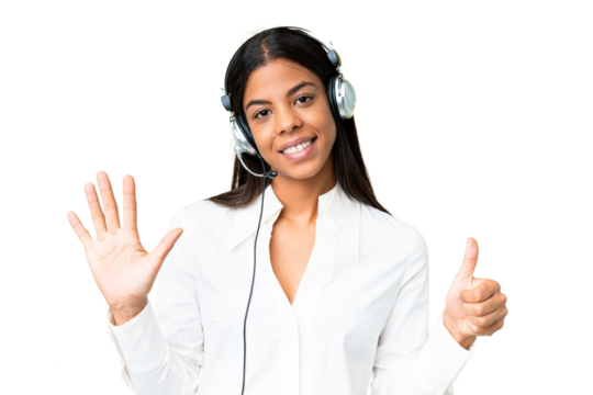 Telemarketer African American woman working with a headset over isolated chroma key background counting six with fingers