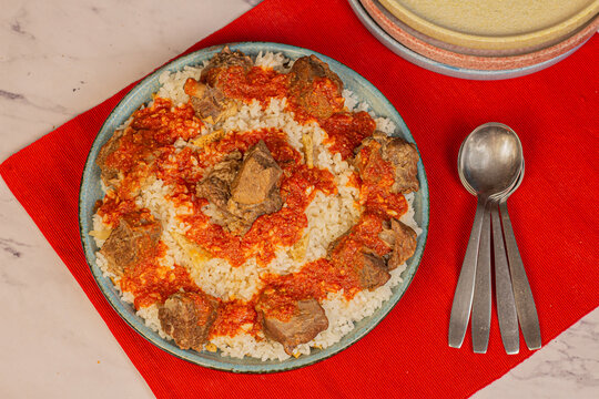 Egyptian Fettah, a traditional plate combined of rice, bread, meat and tomato sauce. 
Usually cooked in the days of Eid Aladha, the Islamic Feast. 