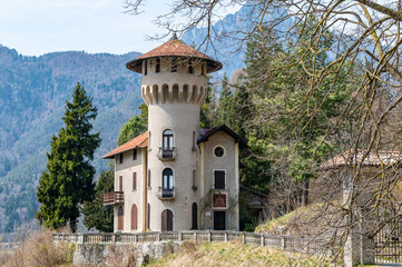 Fototapeta na wymiar The Villa Dianella is 'the castle', historic home from the 900, in a privileged position overlooking the lake of Ledro - Mezzolago, Trento, Trentino Alto Adige, Italy - April 12, 2022