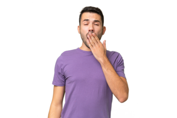 Young handsome caucasian man over isolated background yawning and covering wide open mouth with hand
