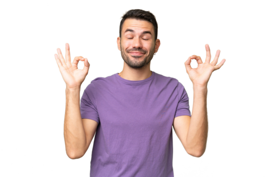 Young handsome caucasian man over isolated background in zen pose