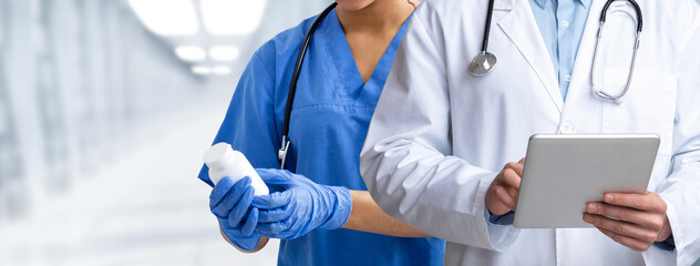 Medical staff working at modern clinic, cropped shot