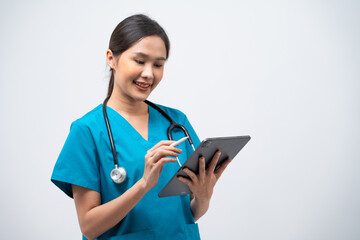 Portrait of Asian female doctor standing with stethoscope using digital tablet isolated on white background.