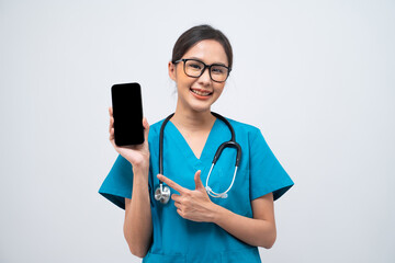 Portrait of Asian female doctor with stethoscope holding smart phone with blank screen isolated on white background.