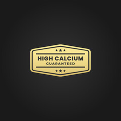 Premium High Calcium Label Vector or High Calcium Seal Vector on Black Background. Best High calcium label for products containing whole milk. For high calcium logos on various products.