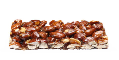 Almond caramelized bar nut, candied isolated on white, side view