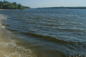 Landscape with Dnipro river on late summer day on central beach of  Zaporizhzhia city, Ukraine